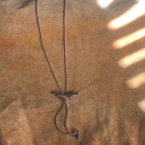 Vintage Avon silver seagull slide